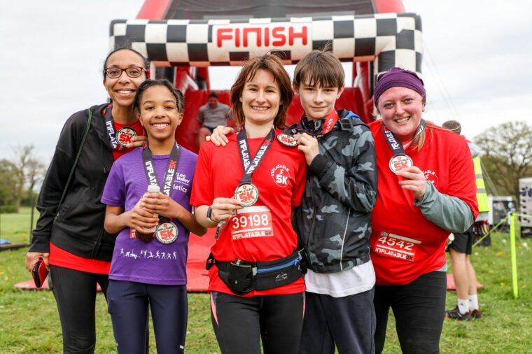 Joanna (right) and her friends at the finish line